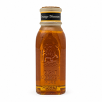Honey Feast Orange Blossom 8oz Muth glass honey gift jar with a natural tapered cork, hand-dipped beeswax finish and matte yellow-bordered neck label, front view on white.