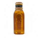 Honey Feast Wildflower 8oz Muth glass honey gift jar with a natural tapered cork, hand-dipped beeswax finish and matte yellow-bordered neck label, front view on white.
