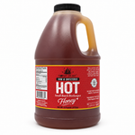 Honey Feast Hot 6lb bulk honey in a frosted HDPE plastic jug, with a wide 48mm cap and handle on the right, on a white background.