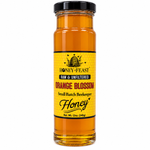 Honey Feast Raw Orange Blossom Honey in a 12oz glass jar with black lid