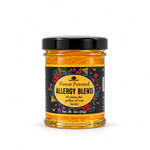 Honey Feast Allergy Blend Honey in a small 3oz glass jar on a white background