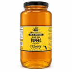 Honey Feast Black Gum Tupelo Honey – 3lb Glass Jar filled with honey, black screw lid, on a white background
