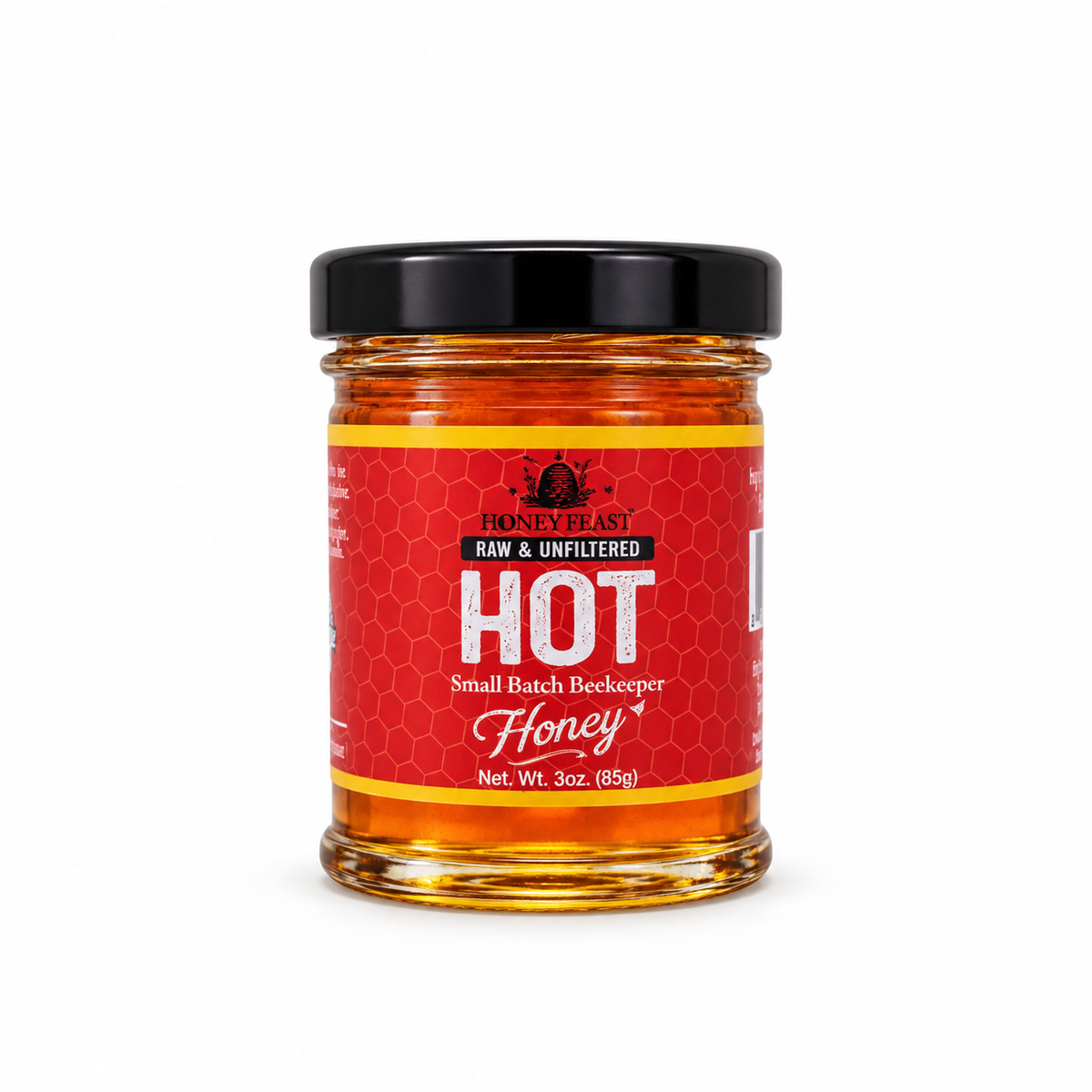 Honey Feast Hot Honey in a small 3oz glass jar on a white background