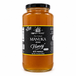 Honey Feast Manuka Infused Honey with Propolis – 3lb Glass Jar filled with honey, black screw lid, on a white background