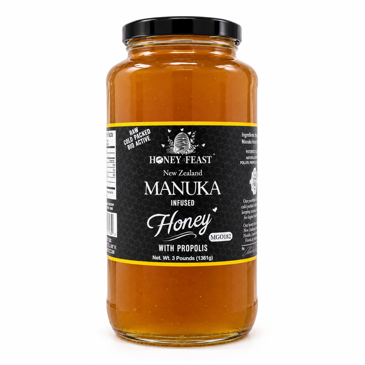 Honey Feast Manuka Infused Honey with Propolis – 3lb Glass Jar filled with honey, black screw lid, on a white background