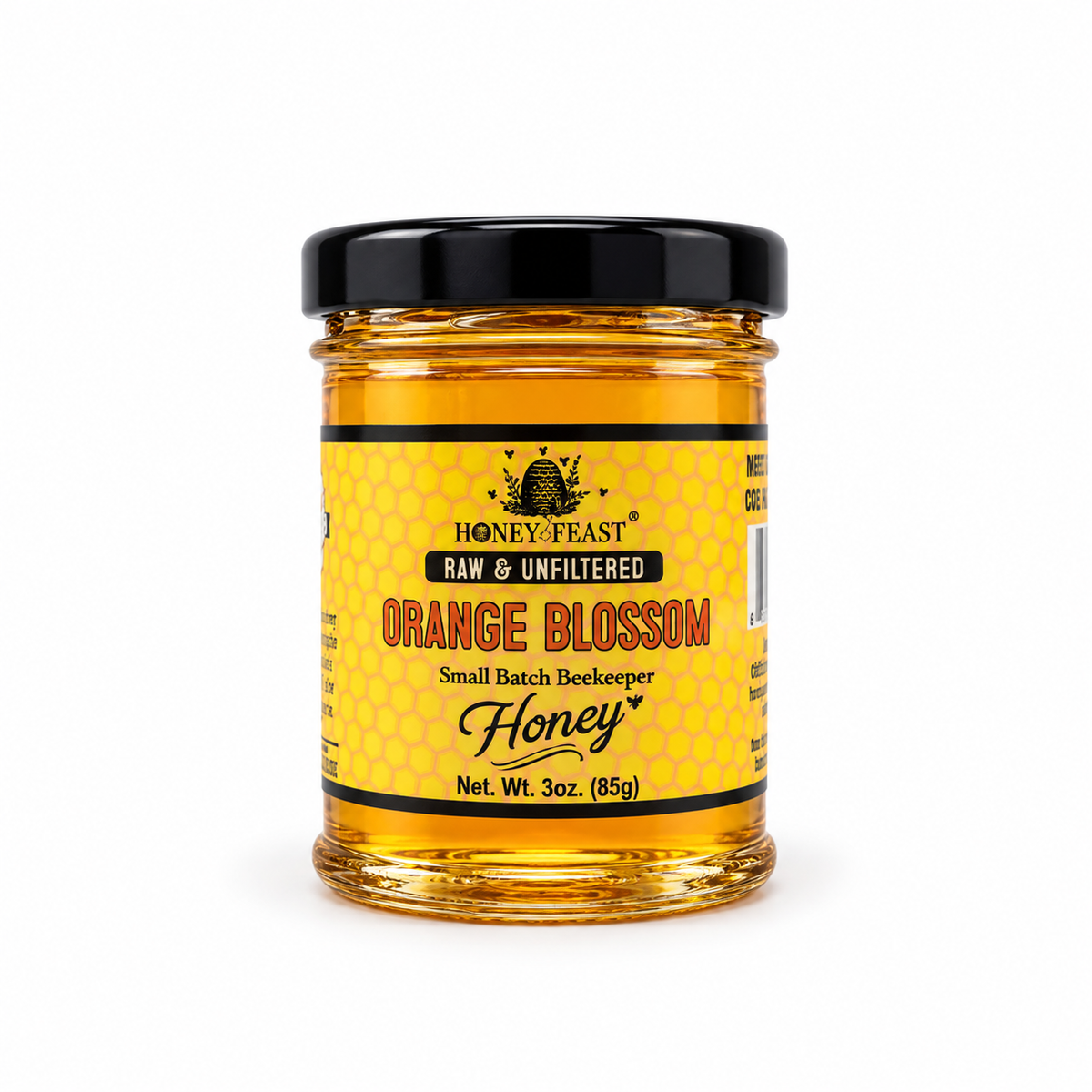 Honey Feast Orange Blossom Honey in a small 3oz glass jar on a white background