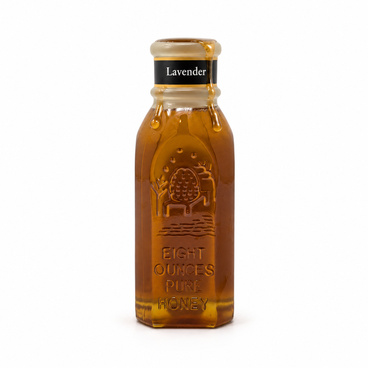 Honey dripping from the open wax-covered rim of Honey Feast Lavender Honey in an 8oz Muth glass jar on white.