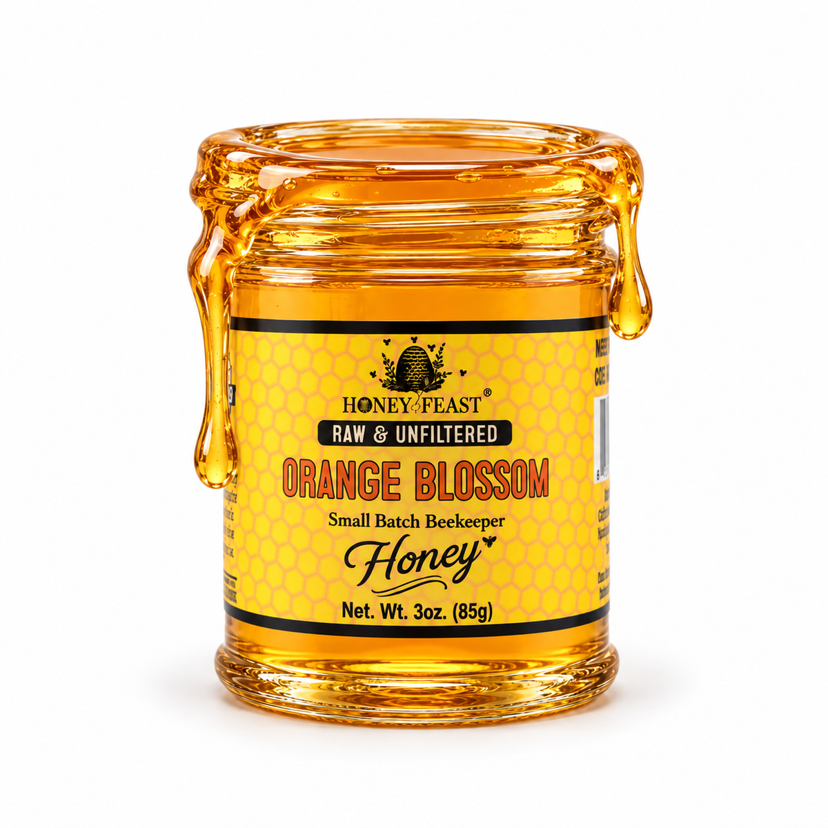 Orange Blossom honey coating the rim and dripping down an open 3oz Honey Feast glass jar