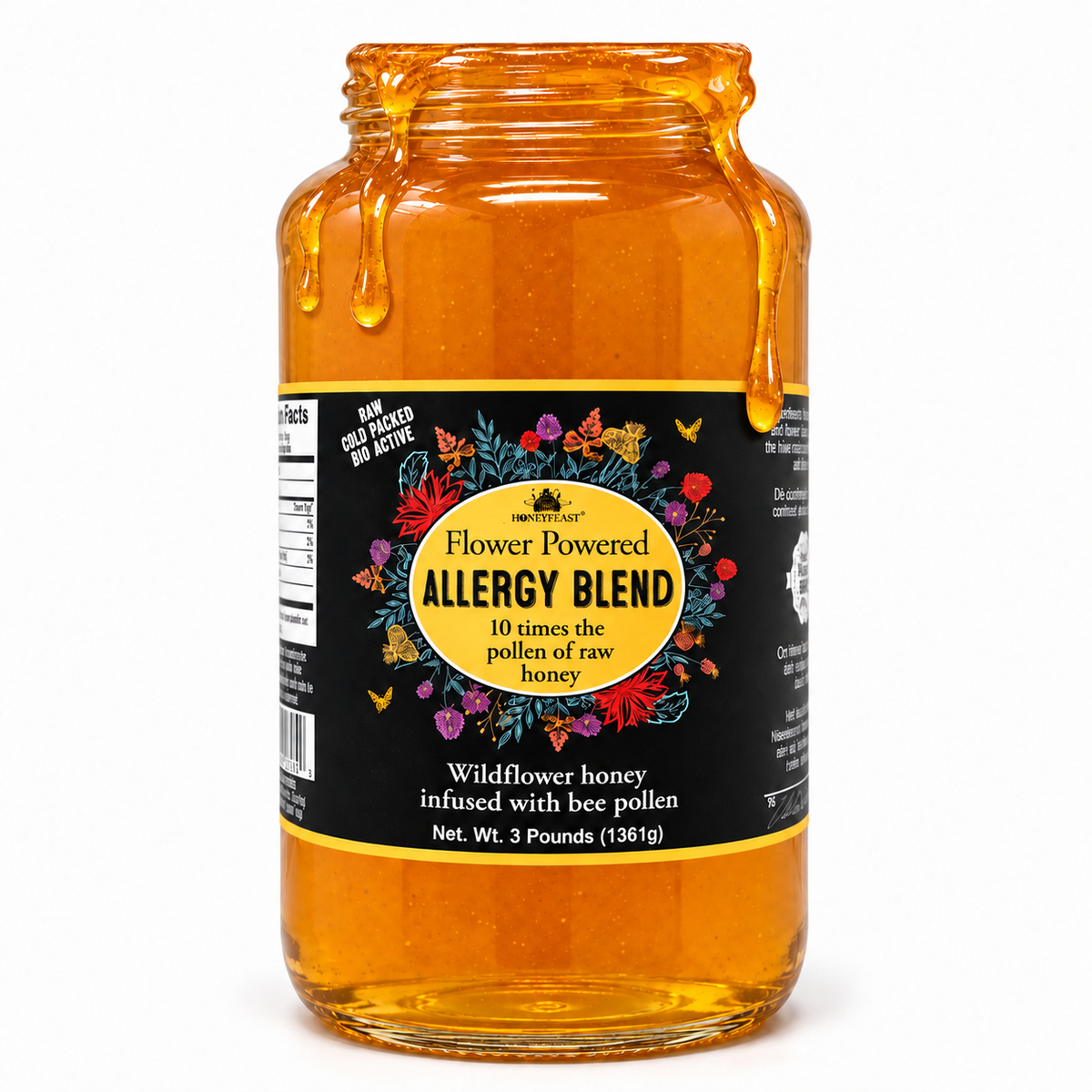 Honey Feast Allergy Blend Honey in an open 3lb glass jar, with honey dripping over the rim, on a white background.