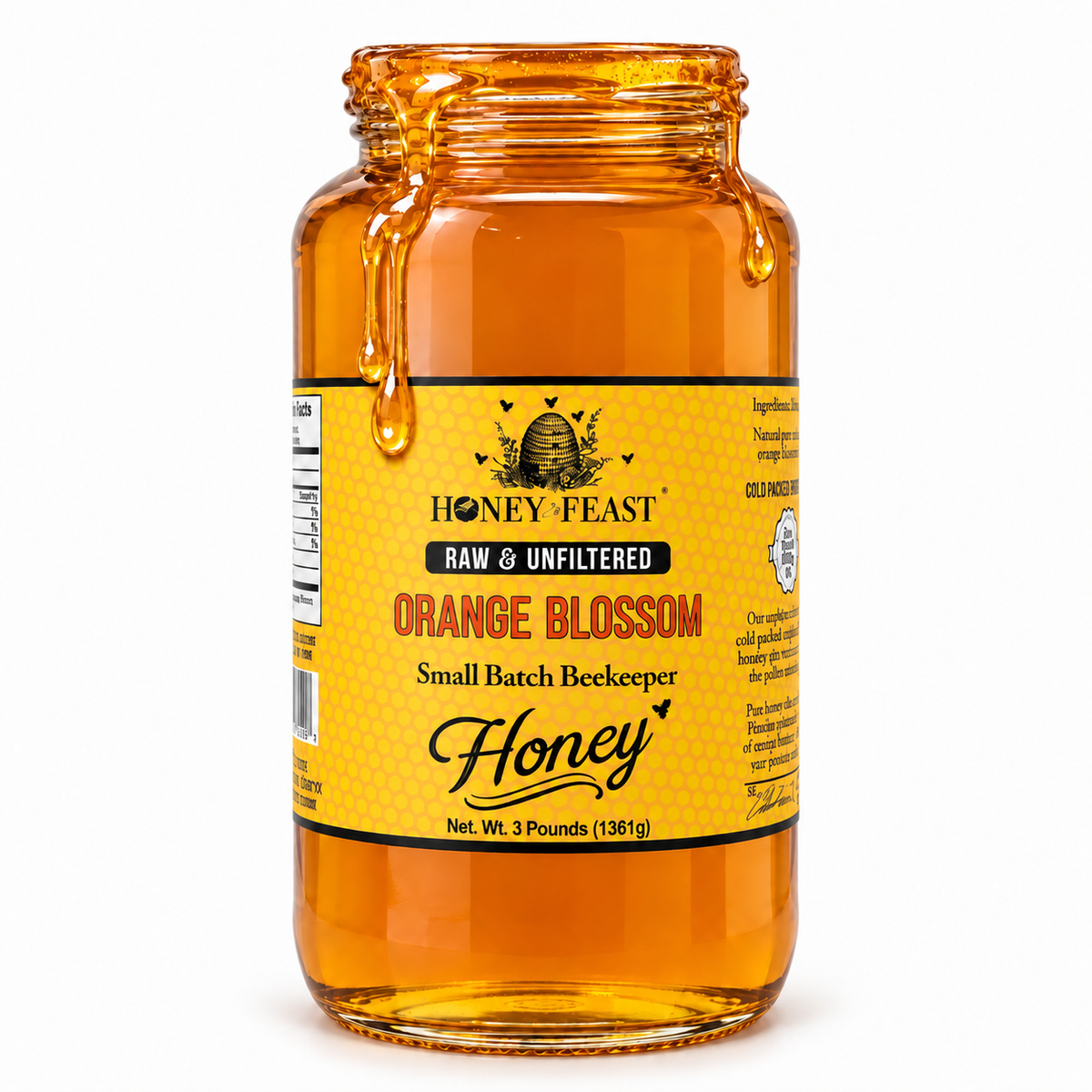 Honey Feast Orange Blossom Honey in an open 3lb glass jar, with honey dripping over the rim, on a white background.
