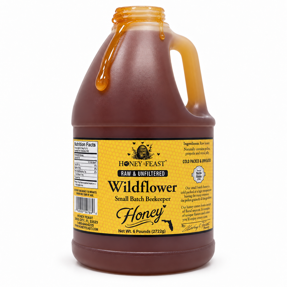 Honey Feast Wildflower 6lb bulk honey in a frosted HDPE plastic jug with the handle on the right, with honey dripping over the open rim on a white background.
