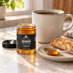 Honey Feast Bourbon Honey 3oz mini glass jar served with coffee