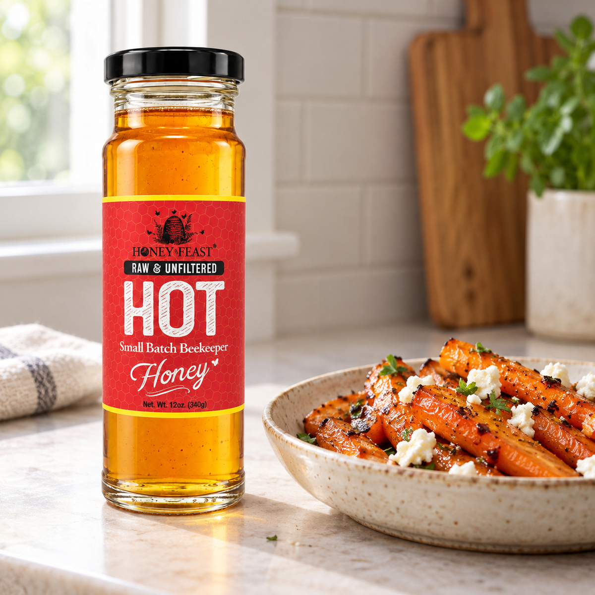 Hot Honey glass jar beside roasted carrots with feta