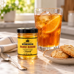 Honey Feast Orange Blossom Honey 3oz mini glass jar served with iced tea