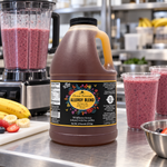 Honey Feast Allergy Blend 6lb bulk honey in a frosted HDPE plastic jug with the handle on the right, commercial smoothie prep.