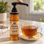Ginger honey dispensed into tea with the optional honey pump, sold separately