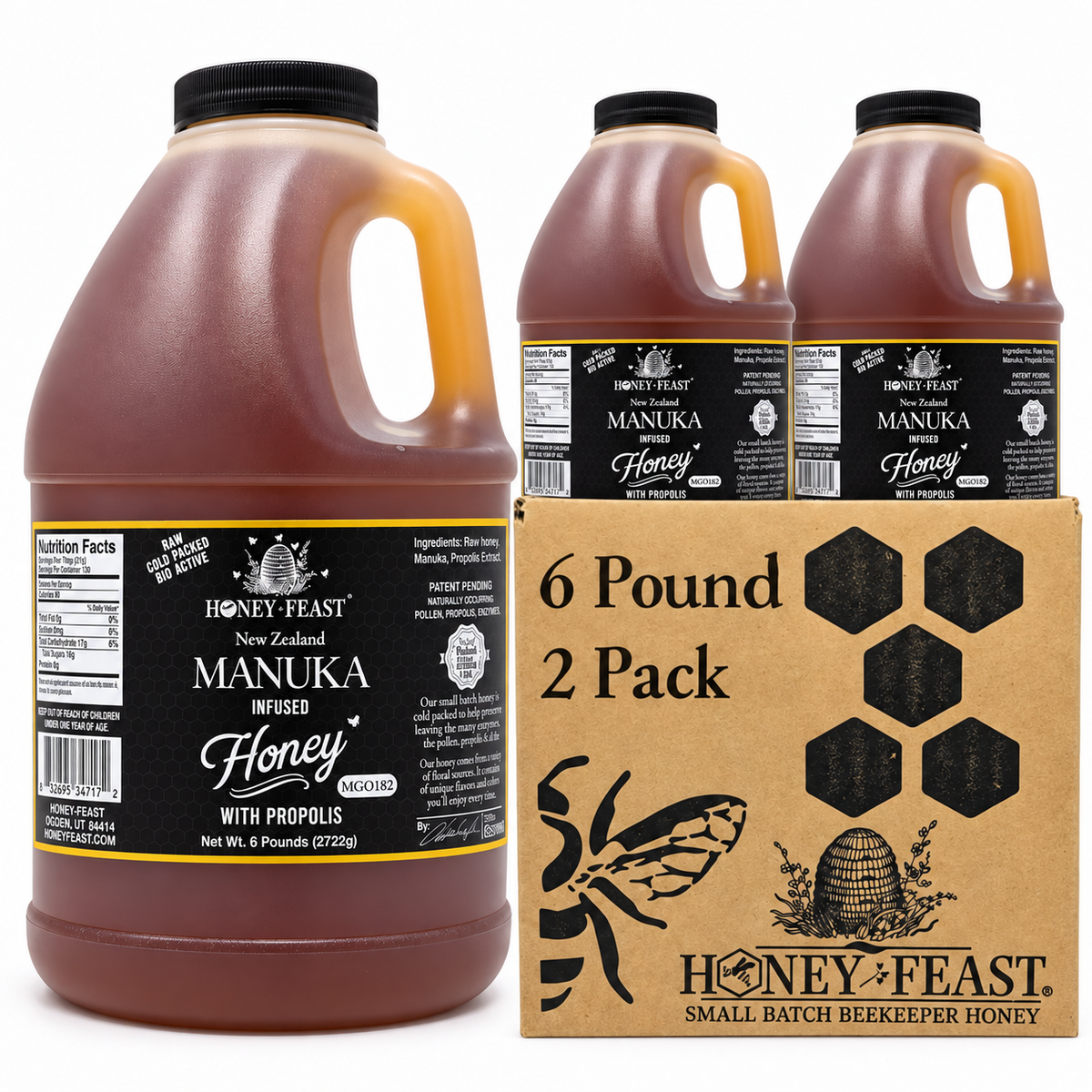Honey Feast Manuka Infused with Propolis honey 2-pack of 6lb frosted HDPE plastic jugs with wide black screw caps, shown with the branded shipping carton on a white background.