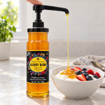 Honey Feast Allergy Blend Honey 12oz glass jar with optional honey pump beside yogurt; pump sold separately