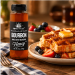 Honey Feast Bourbon Honey 12oz plastic bottle beside waffles, berries and honey