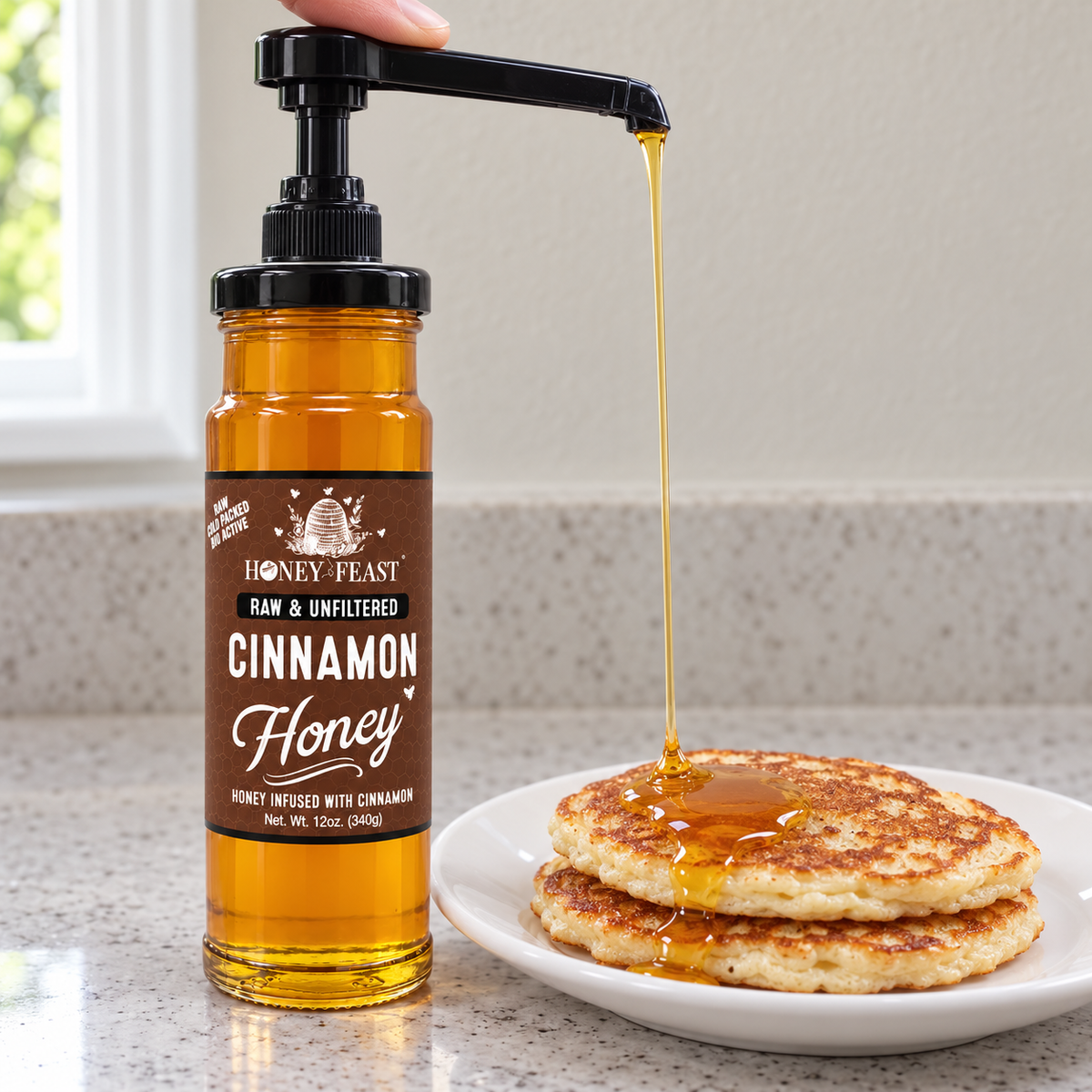 Honey Feast Cinnamon Honey 12oz glass jar with optional honey pump beside pancakes; pump sold separately