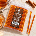 Cinnamon Honey Sticks 50-pack lying flat beside cinnamon, toast and tea with full-length loose sticks