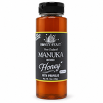 Honey Feast Manuka Infused Honey with Propolis in a tall 12oz plastic squeeze bottle with its original black label and black flip-top cap, on a white background
