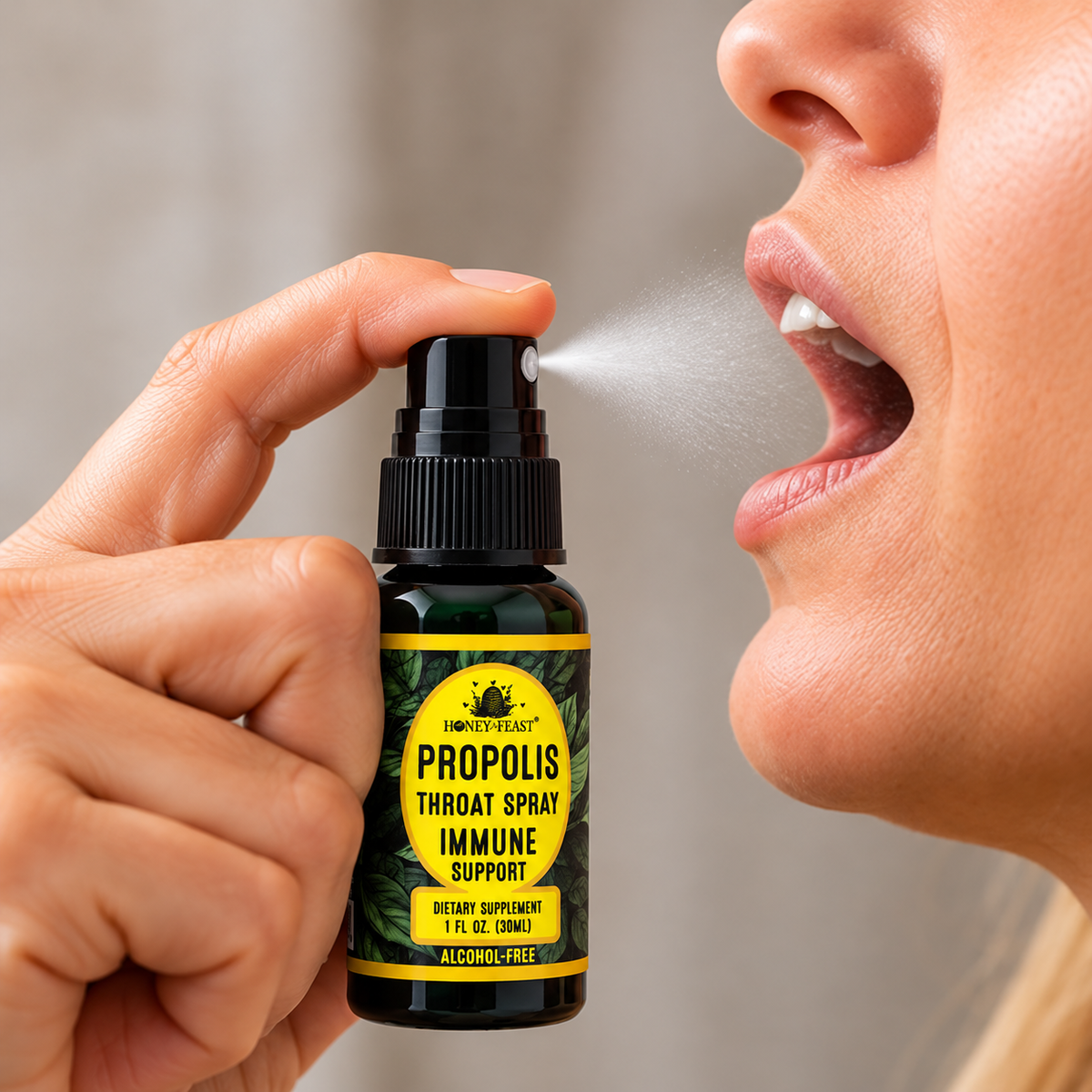 Honey Feast Propolis Throat Spray shown in use