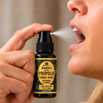 Honey Feast Manuka-Infused Peppermint Propolis Throat Spray shown in use