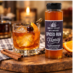 Spiced Rum Honey 12oz plastic bottle in a natural flavor-relevant serving scene