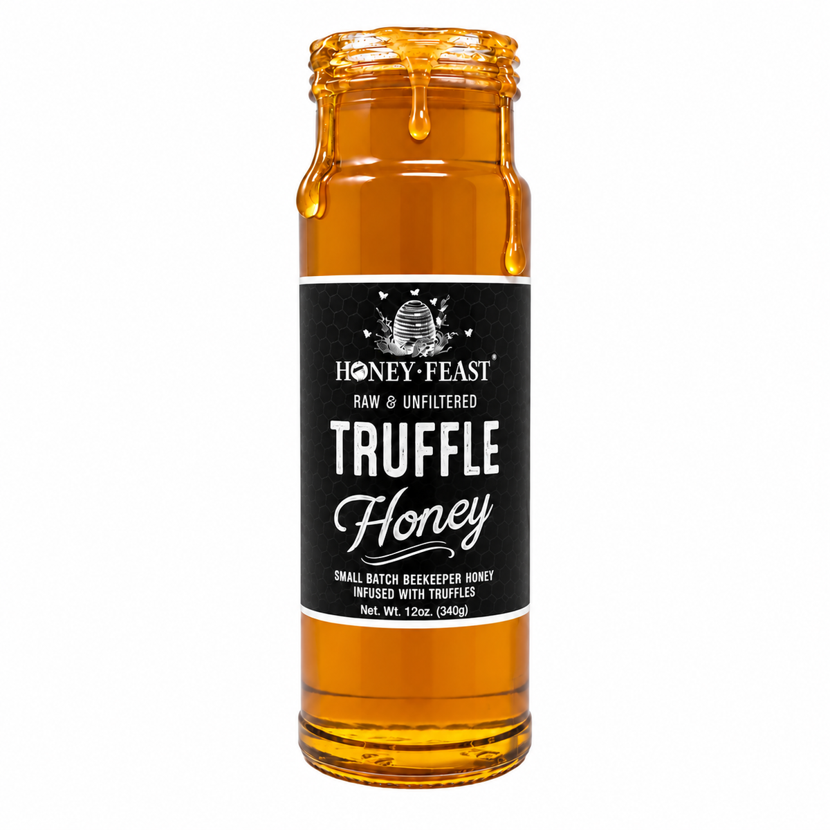 Honey Feast Truffle Honey in an open 12oz glass jar with honey dripping down the side