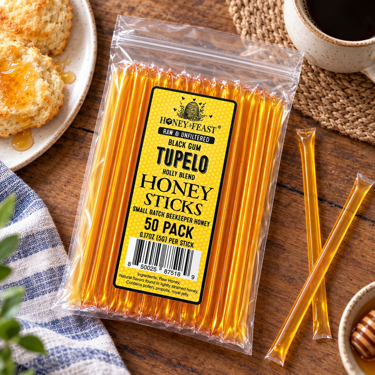 Black Gum Tupelo Honey Sticks 50-pack lying flat beside coffee and biscuits, with full-length loose sticks