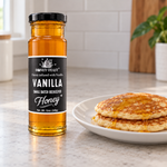 Vanilla honey glass jar beside pancakes