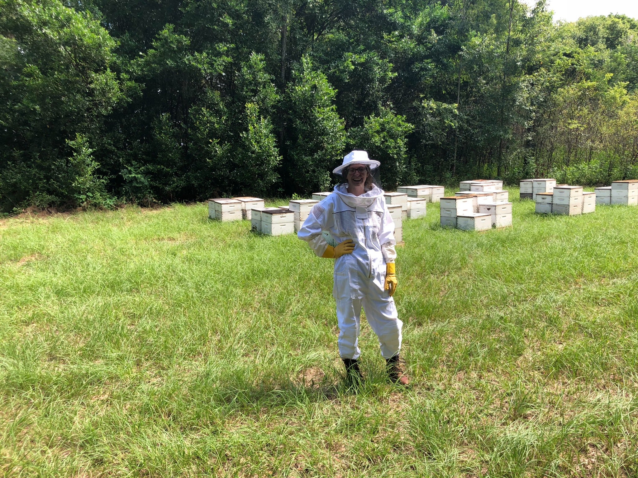 Honey Feast beekeeper in a Florida bee yard