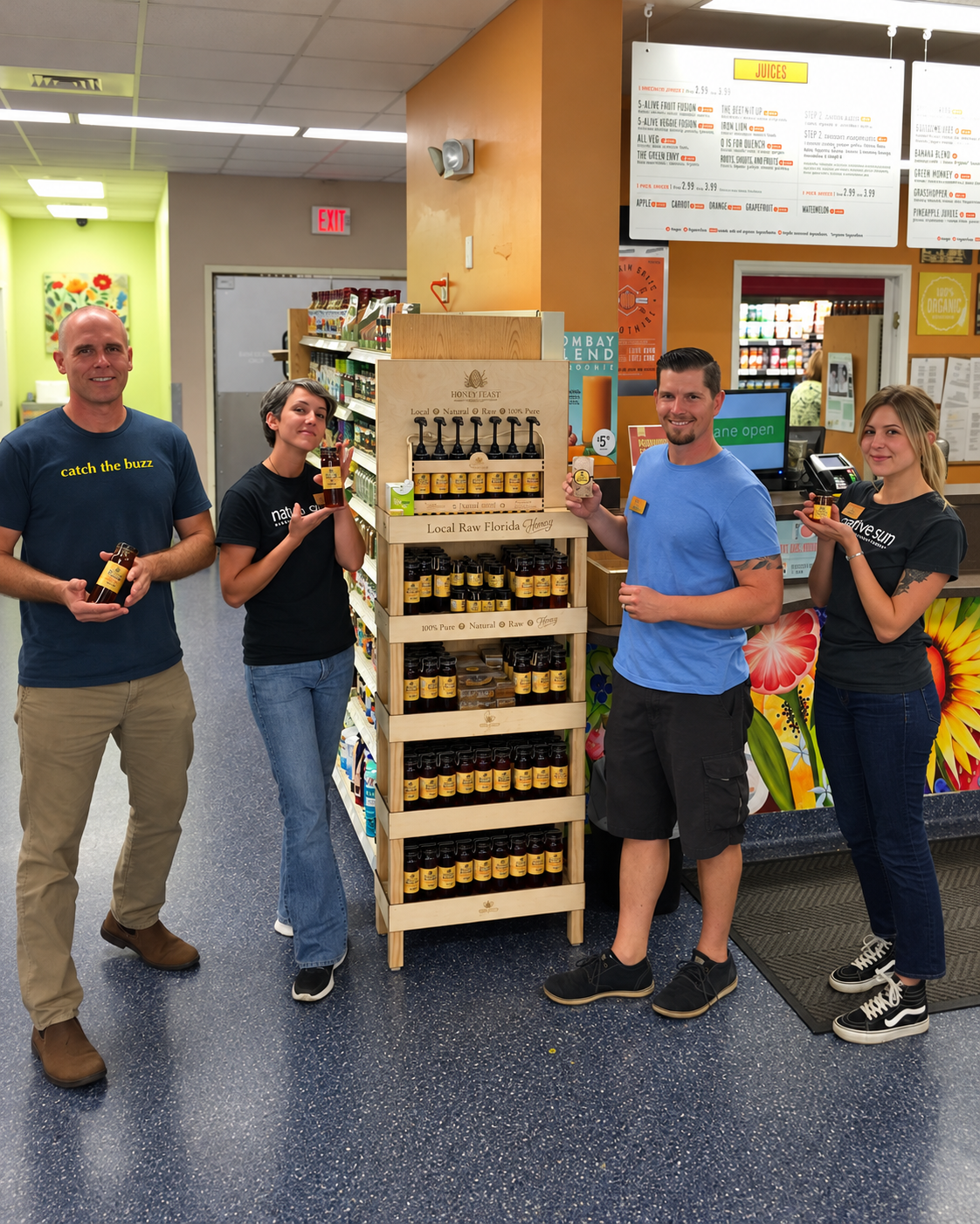 Honey Feast team with an in-store honey display