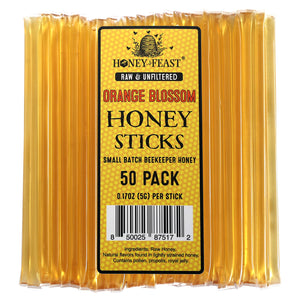 
            
                Load image into Gallery viewer, HONEY FEAST Orange Blossom Honey Sticks - 50 Pack Raw Honey Stick, Pure &amp;amp; Unpasteurized Honey from Oranges, Perfect On-the-Go Snack
            
        