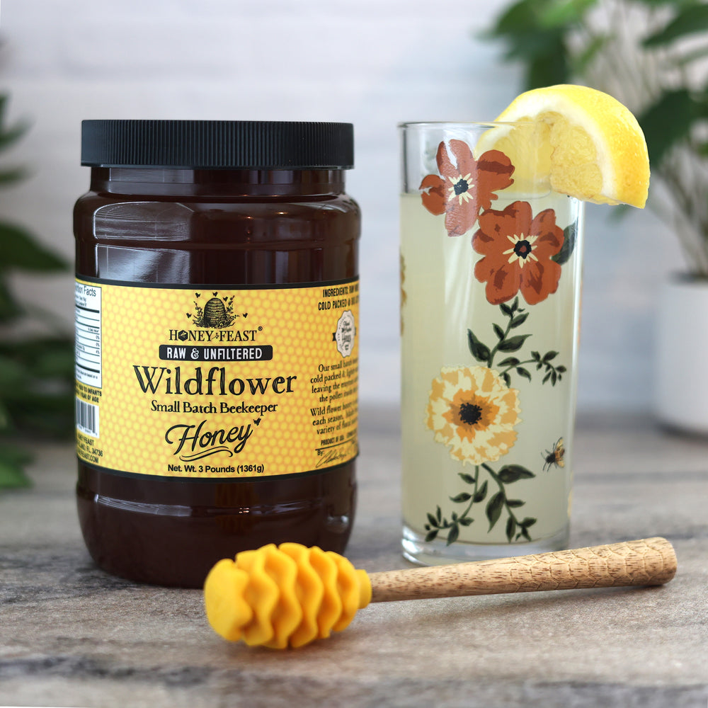 
            
                Load image into Gallery viewer, Honey Feast Bulk Wildflower Honey 3lb – Raw Unheated Honey, Ideal for Culinary Use, Naturally Unfiltered with a Symphony of Floral Notes
            
        